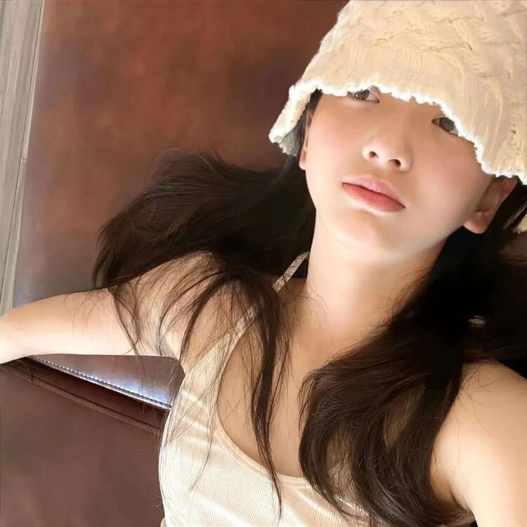 L.