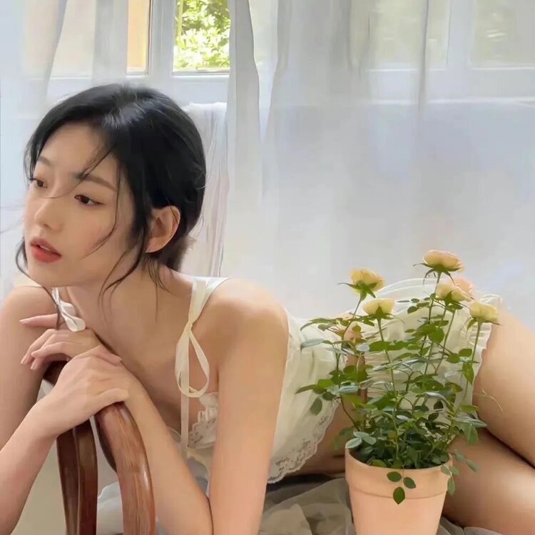 L.