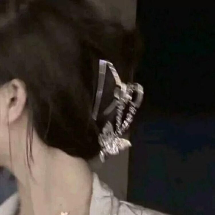 L.