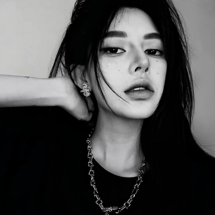 L.