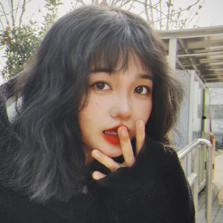L.