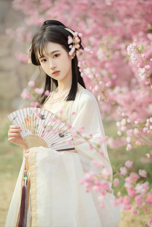 桃花十里春风十里不如你